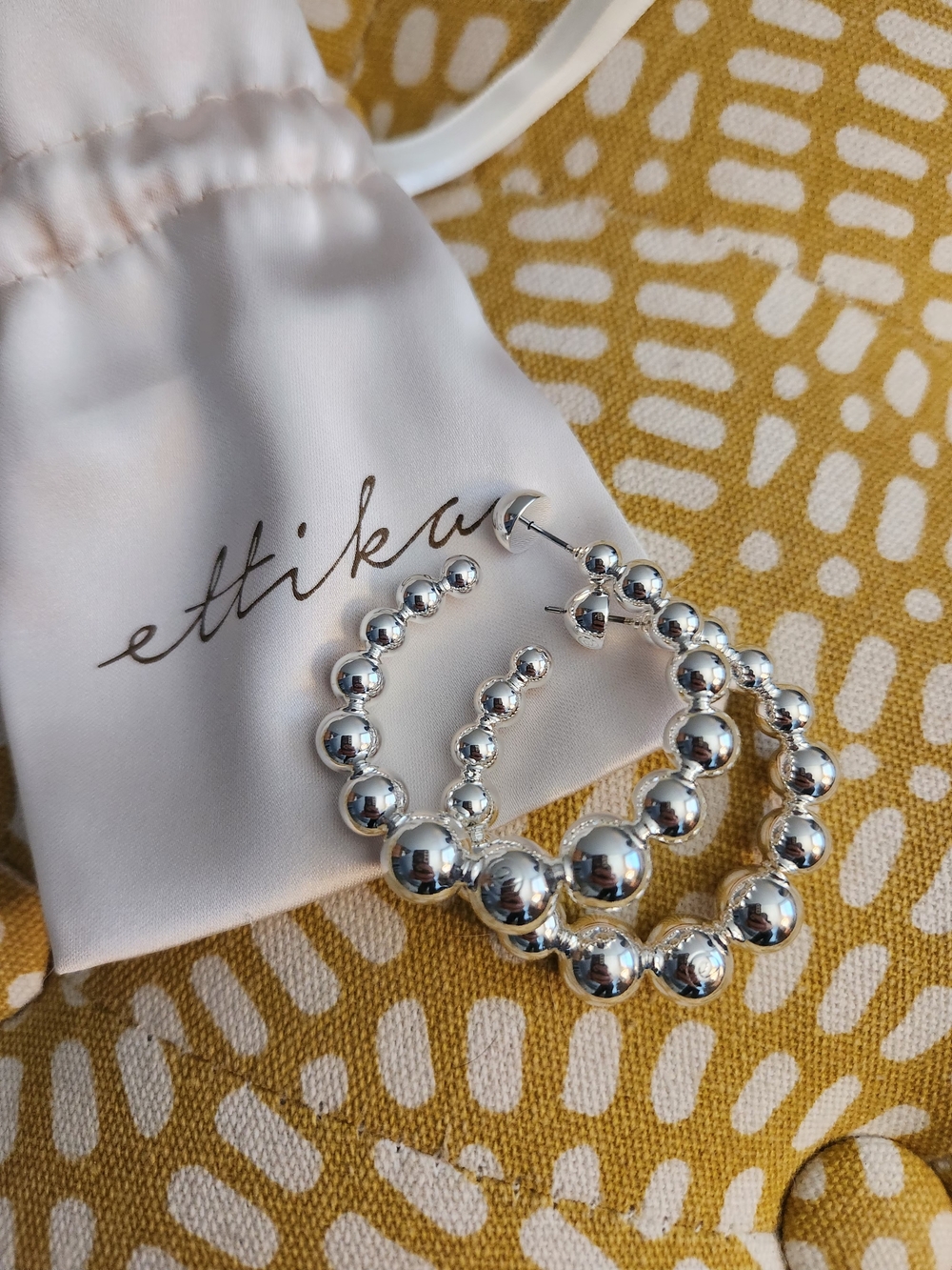 ettika Polished Silver Beaded Hoop Earrings.  NWOT